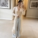 Maxi Cardigan Tricot Longo com Botões e Manga Flare - Bege Claro